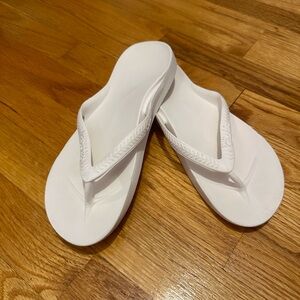 Archies white flip flops